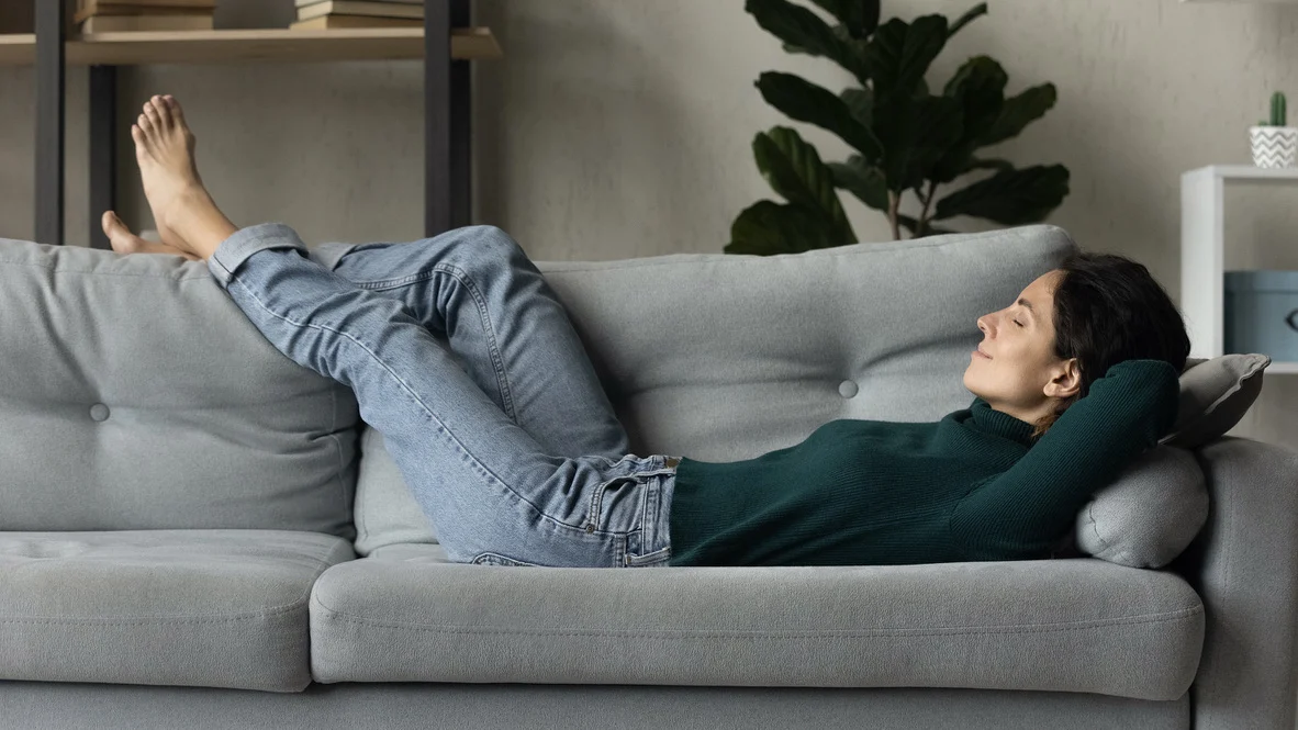 Satisfied HVAC customer rests in her comfortable Ogden home